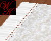 {WK}furry white rug