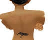 Dolphin back tattoo