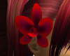 red orchid hair flower