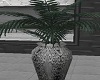 Plant in gray vase