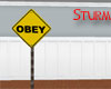 OBEY sign