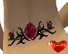 Lower back rose tattoo