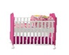 pink and white girl crib
