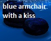 blue armchair with a kis