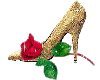 gold shoe and red rose