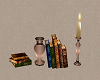 Books, candles and vase