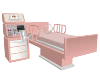 Pink and white labor bed