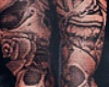 Skull arm tattoo