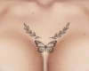 e. butterfly chest tatto