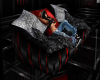 red skulls cuddle couch
