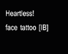 Heartless face tattoo