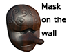 :G: Mask on the wall