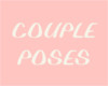 A: Couple poses sign