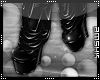 [A] black PVC boots