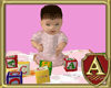 baby girl with blocks