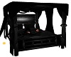 Black canopy bed