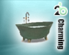 greenish clawfoot tub