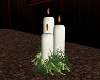 white candles with sage
