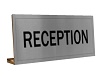 reception desk sign grey