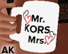 "Mr. Mrs. Kors" Mug Pose