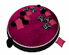 Round pink and black bed