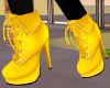 Yellow laced heeled boot
