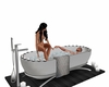 Couples relax+poses tub