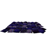 bunch of purple pillows