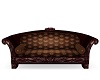 Brown carved couch