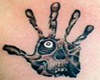 skull belly tattoo