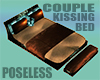 Couple Kissing Bed