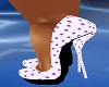 purple polkadotted pumps