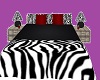 black and red zebra bed