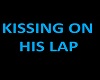 Kissing on his lap