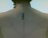 Male back 'B' tattoo