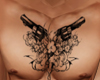 Guns chest tattoo
