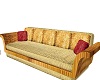gold n red wicker couch