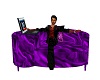 PURPLE SOFA WITH LAPTOP