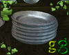 *G Stacked Pewter Plates
