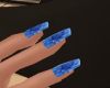 blue flower on nails