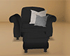 Black Stuffed Chair with Ottoman and Pillows drv