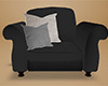 Black Stuffed Chair with Pillows (left) drv