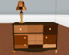 brown dresser w/ lamp