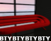 B} Red Oval Couch