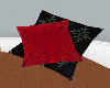 red and black pillows