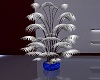White plant blue vase