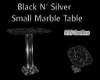 BlackNSilverMarbleTable