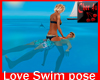 love swim couple pose