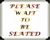 wait to be seated sign