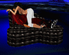 black  kissing couch